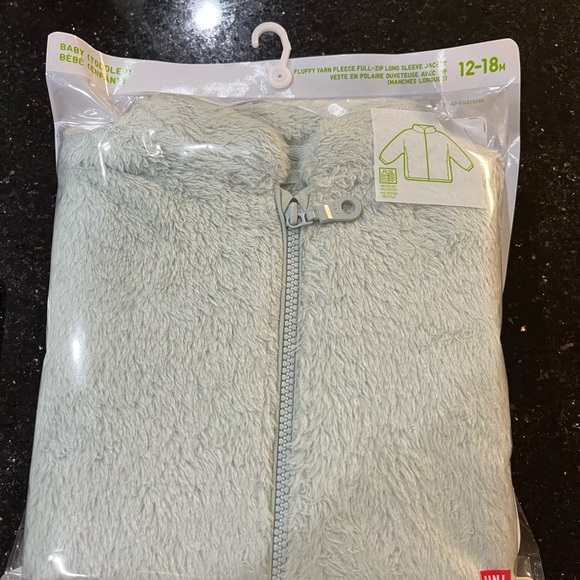 Uniqlo light green fluffy zip up - Picture 1 of 3